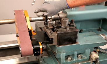 {Automatic Sanding Belt Holders }